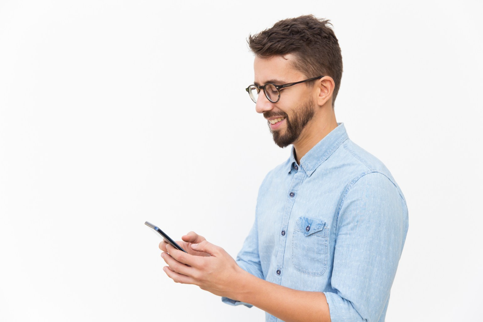 joyful guy texting message on smartphone 1